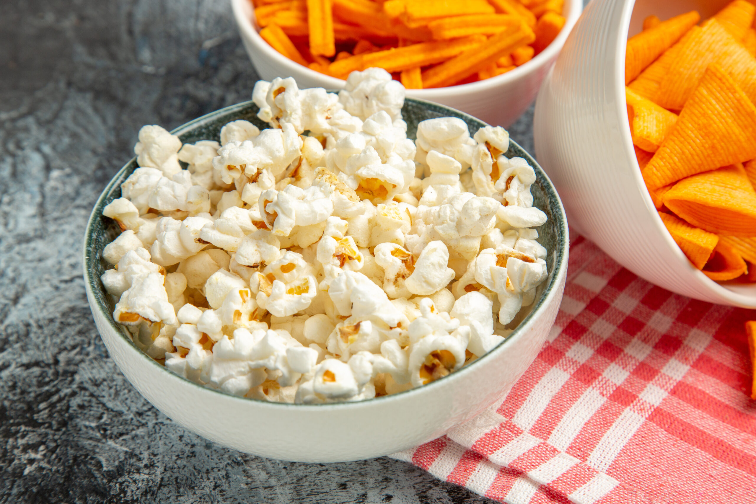 Measuring popcorn calories in a healthy snack bowl
