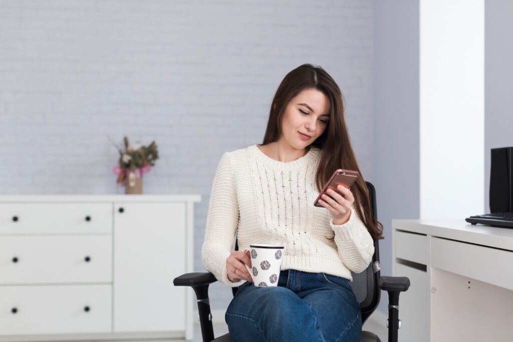 Woman stretching neck to prevent text neck syndrome and improve balance