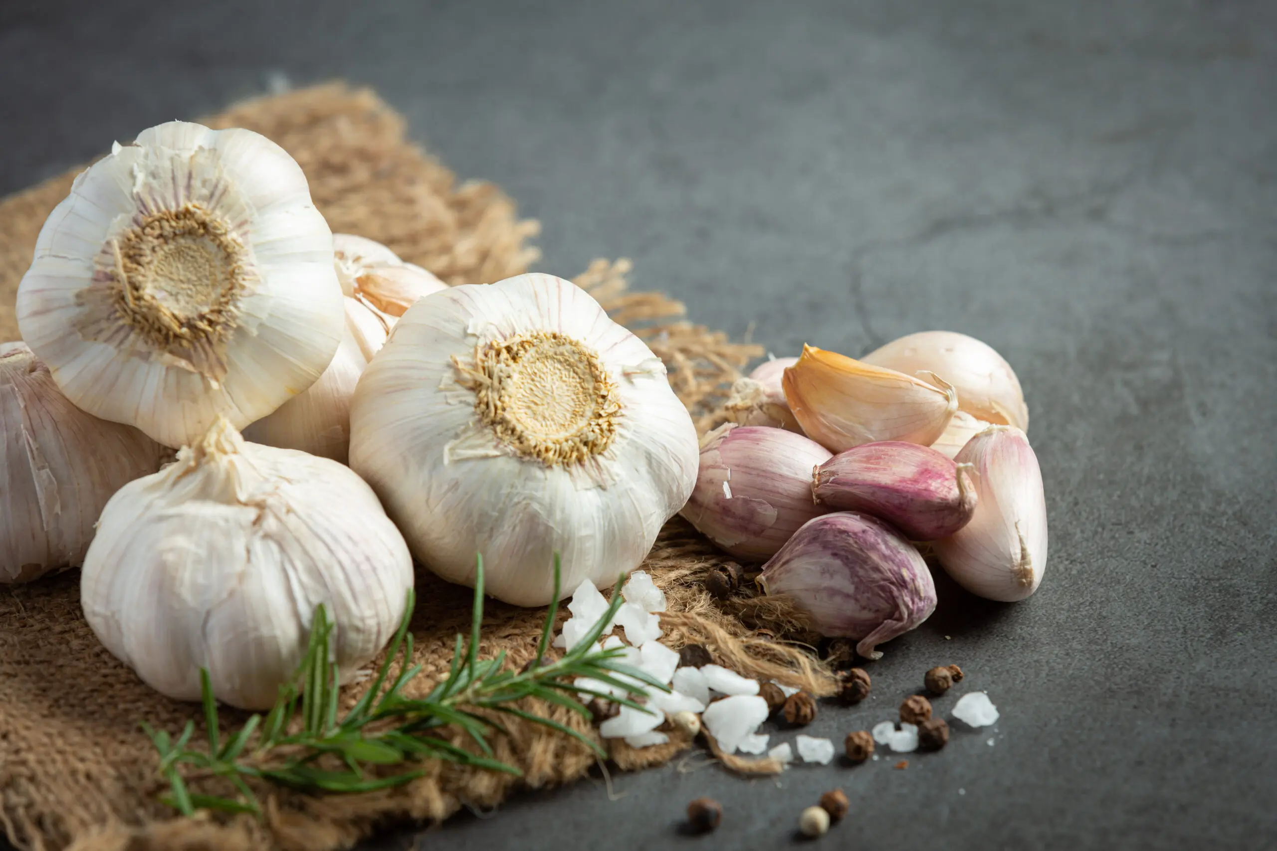 Garlic Benefits: The Ancient Superfood the Modern Body Still Needs Fresh garlic bulbs highlighting garlic benefits for health