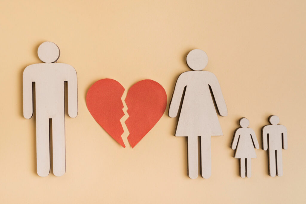 Divorced parents supporting their child together, symbolizing co-parenting|co-parenting tips after divorce|co-parenting tips|co-parenting tips|co-parenting tips|