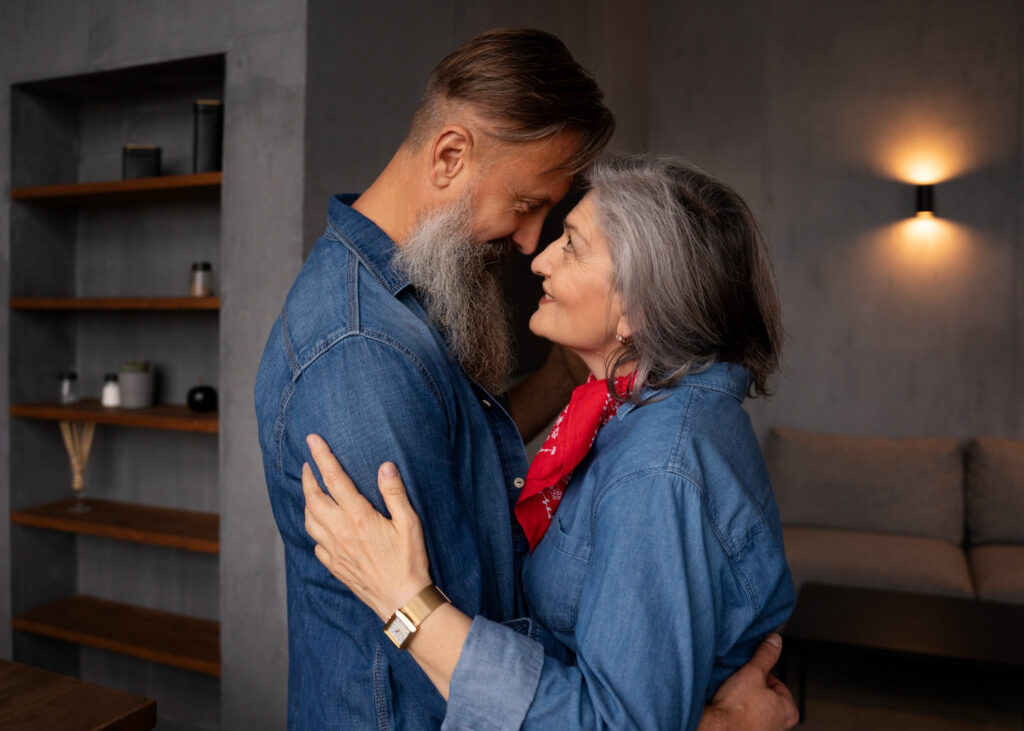 Sexual Satisfaction After 50: Understanding Health Benefits of Old Age Sex Elder couple laughing together, symbolizing intimacy and happiness