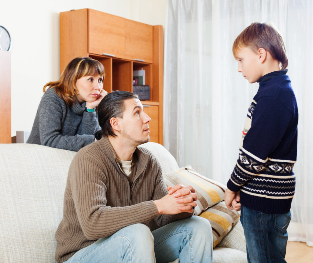 Parent comforting child, representing effective parenting techniques