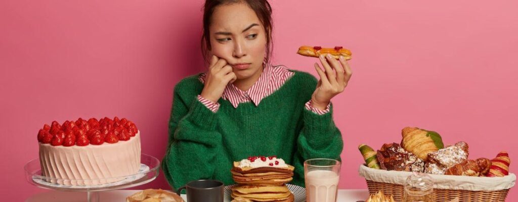 Person holding dessert symbolising craving for sweets|Craving Sugary And Salty Foods All the Time Here’s Why|Craving Sugary And Salty Foods All the Time Here’s Why|Craving Sugary And Salty Foods All the Time Here’s Why||Craving Sugary And Salty Foods All the Time Here’s Why|Craving Sugary And Salty Foods All the Time Here’s Why|Craving Sugary And Salty Foods All the Time Here’s Why|Craving Sugary And Salty Foods All the Time Here’s Why|Craving Sugary And Salty Foods All the Time Here’s Why|Craving Sugary And Salty Foods All the Time Here’s Why|Craving Sugary And Salty Foods All the Time Here’s Why