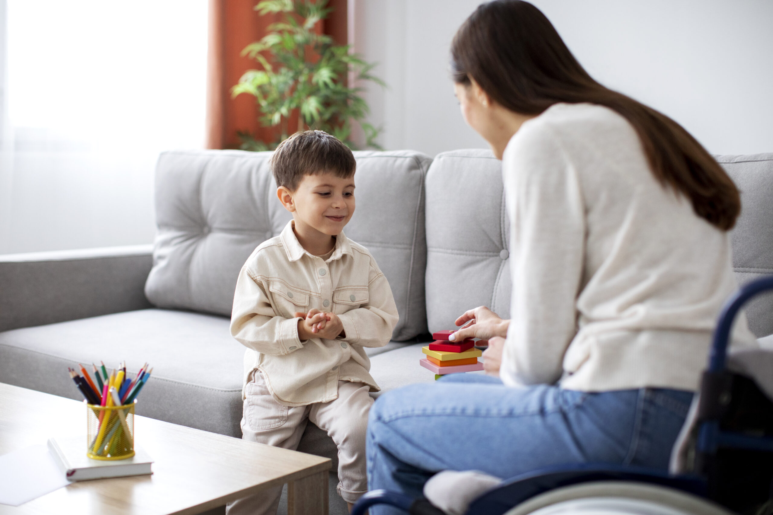 Child smiling in a therapy session, highlighting cerebral palsy recovery