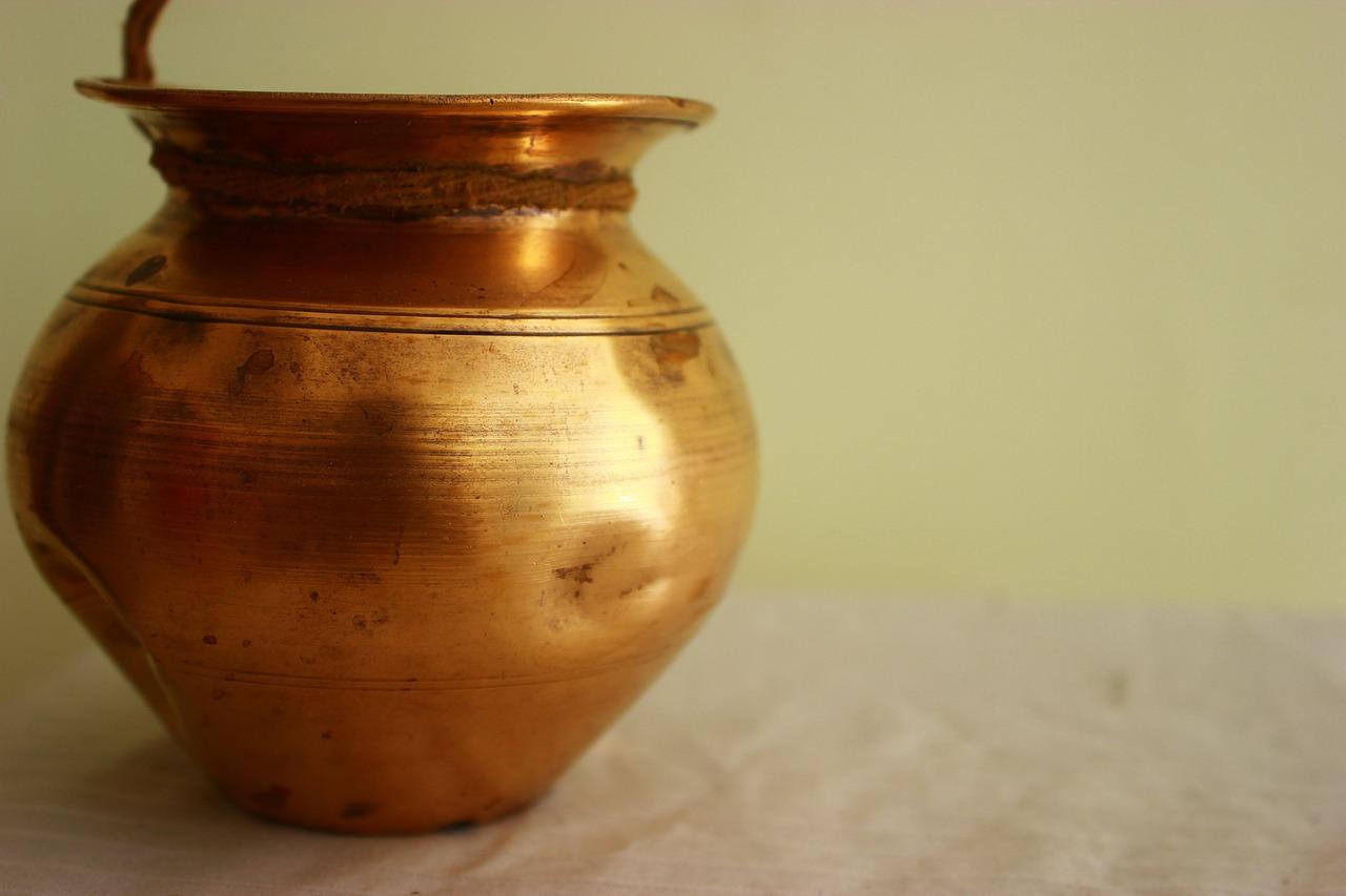 Using A Copper Bottle For Drinking Water? Close-up of copper bottle used for storing water