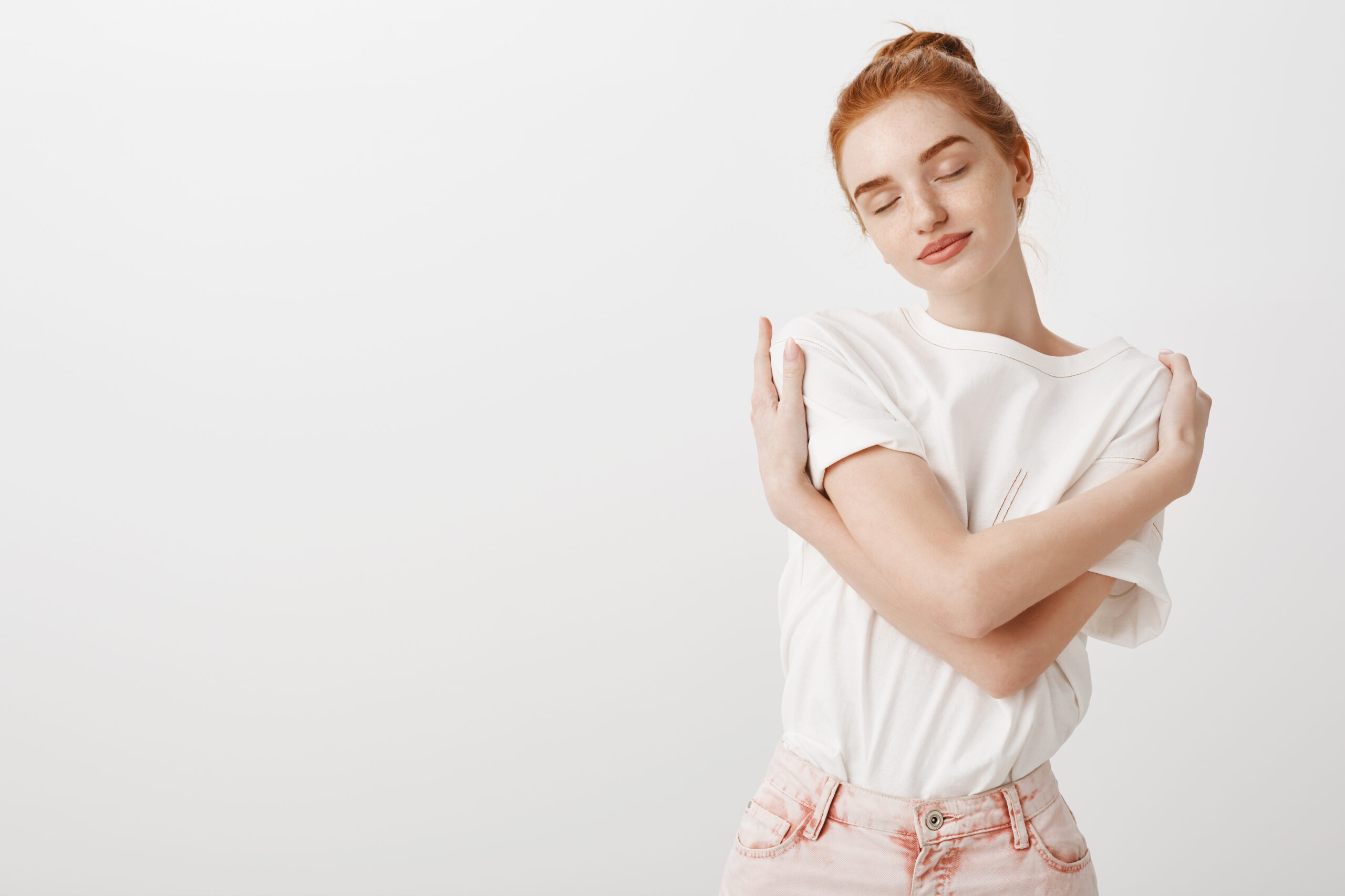 Managing Compassion Fatigue: A Gentle Guide for Every Caregiver Who’s Tired but Still Showing Up Tired caregiver resting with head in hand, symbolizing compassion fatigue